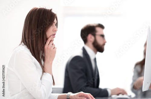 Wallpaper Mural side view.business woman sitting at her Desk Torontodigital.ca