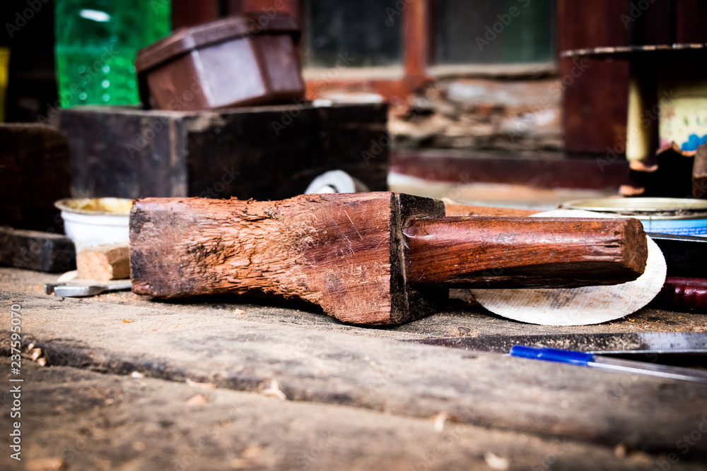 Carpenter wooden hammer on table big brown Carpenter wooden hammer on table big brown