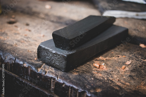 Carpenter blade sharpener black stone photo