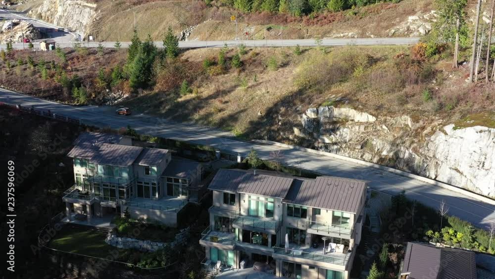 A perfect neighbourhood. Houses in suburb at Summer in the north America. Luxury houses with nice landscape. Aerial drone view. A perfect neighbourhood. Houses in suburb at Summer in the north America. Luxury houses with nice landscape. Aerial drone view.