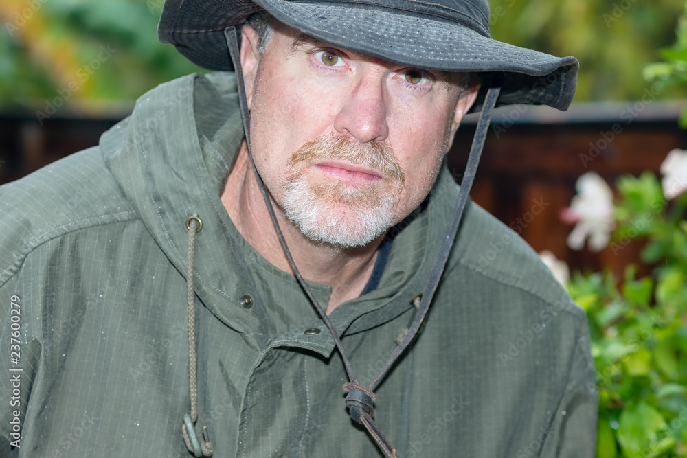 Close portrait of a mature man in hat Close portrait of a mature man in hat