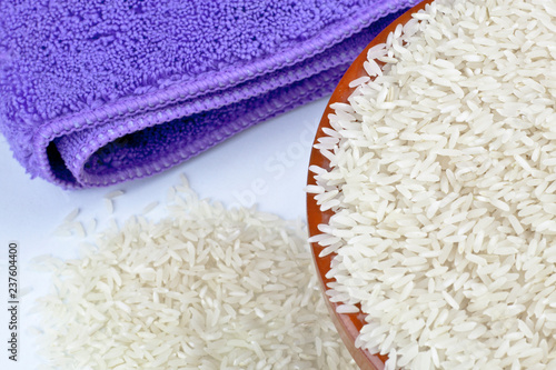 Bowl of rice and kitchen towel