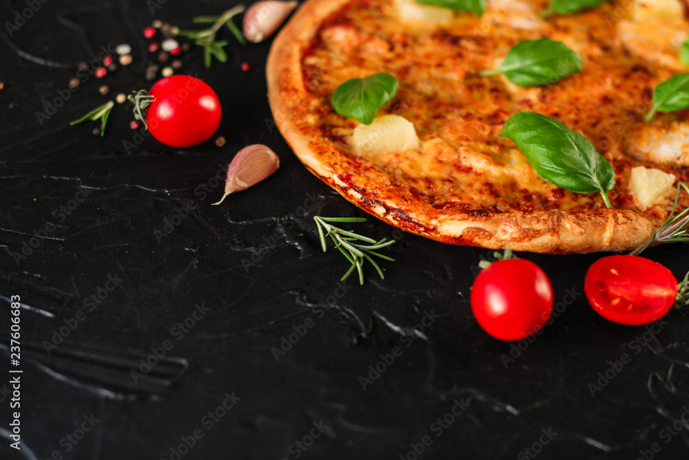 pizza, pineapples, chicken, tomato sauce, vegetables, basil (pizza ingredients). food background. copy space