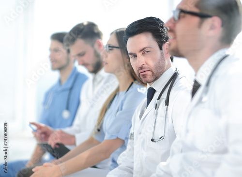 Male doctor with colleagues