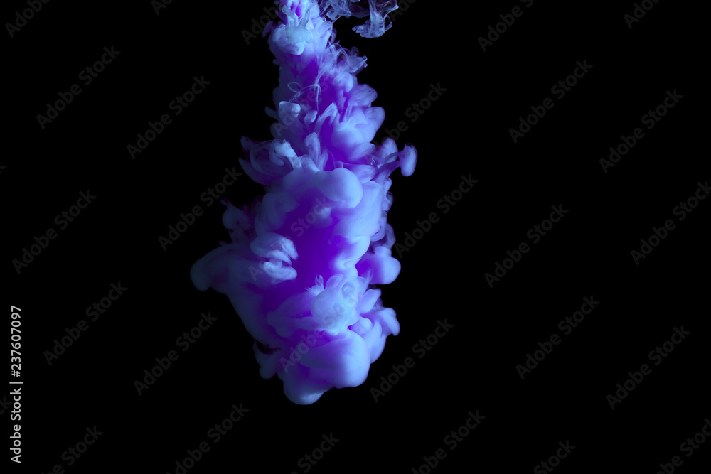 paint stream in water, colored ink cloud, abstract background, process of liquefaction blue dye on a black background paint stream in water, colored ink cloud, abstract background, process of liquefaction blue dye on a black background