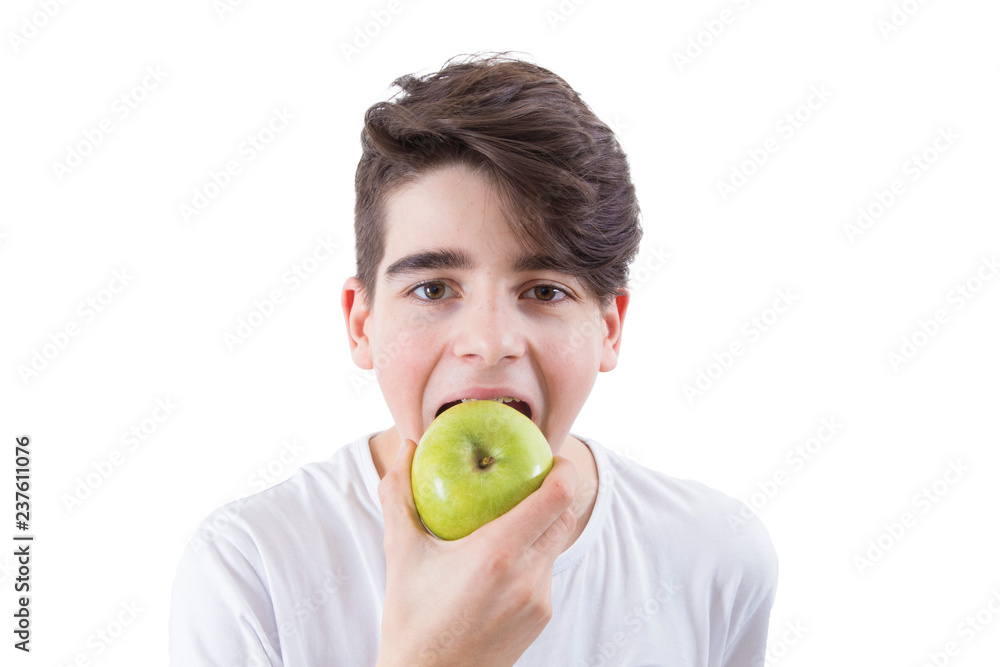 portrait of young eating and biting the apple portrait of young eating and biting the apple