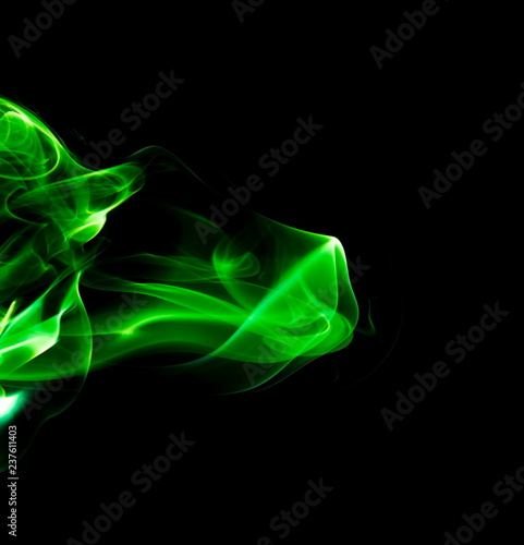 Green smoke on black background