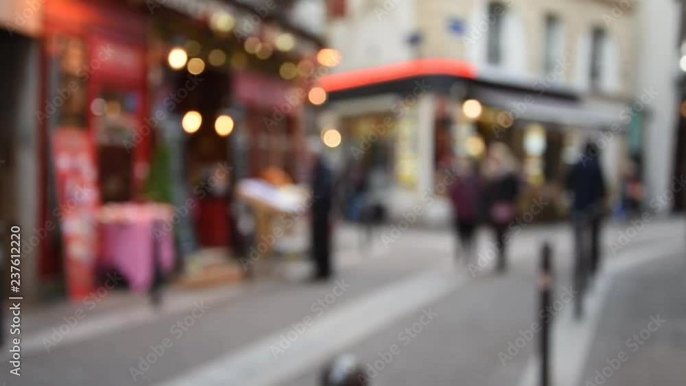Cityscape blurred background with unrecognizable people walking on the street Cityscape blurred background with unrecognizable people walking on the street