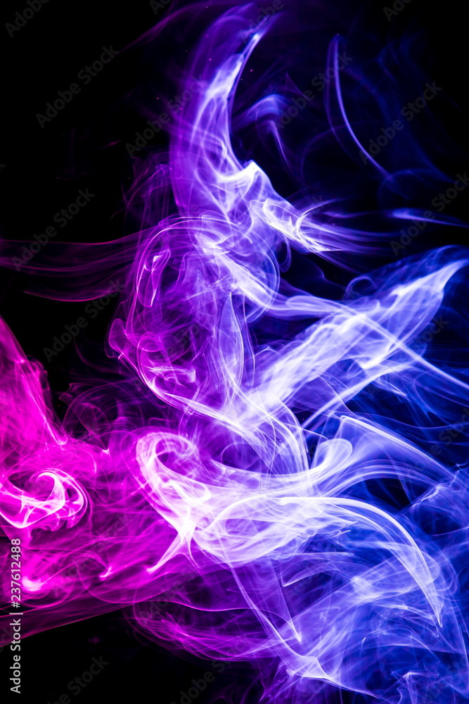 Colored smoke on black background Colored smoke on black background
