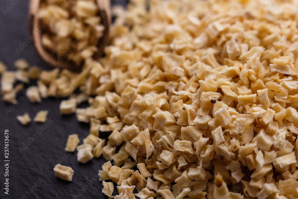 fragrant dried parsnip on a dark stone background fragrant dried parsnip on a dark stone background