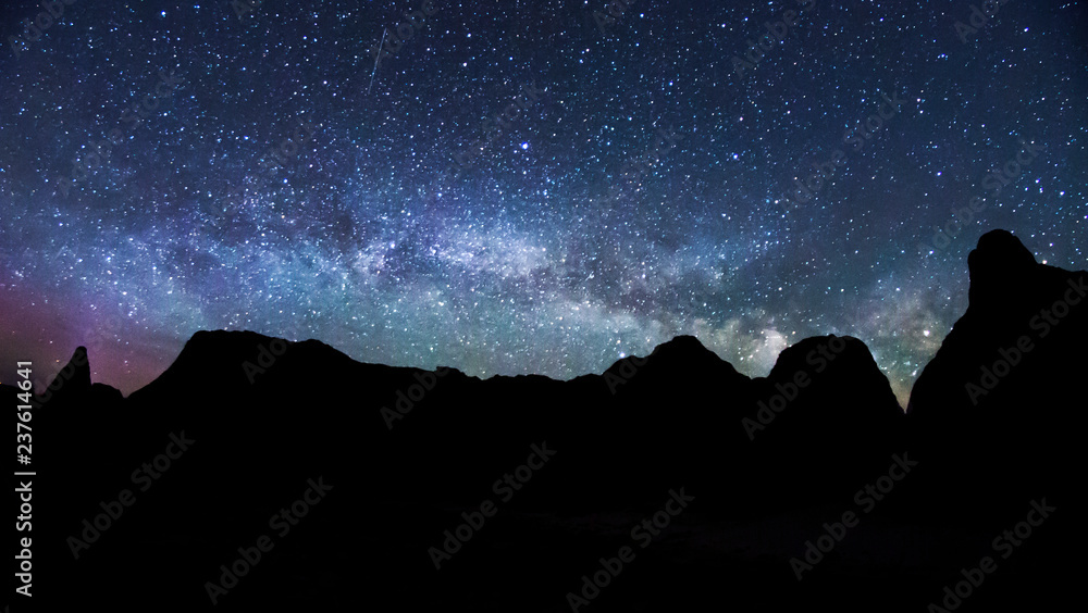 Milky Way Rising Over Badlands National Park - obrazy, fototapety, plakaty 