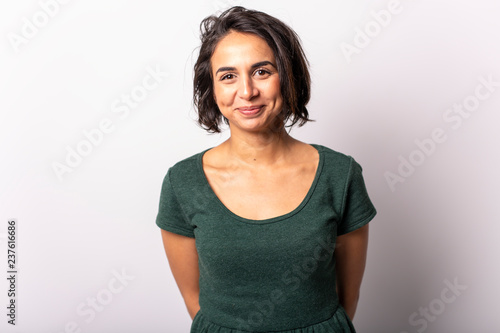 bright brunette girl isolated on a white background
