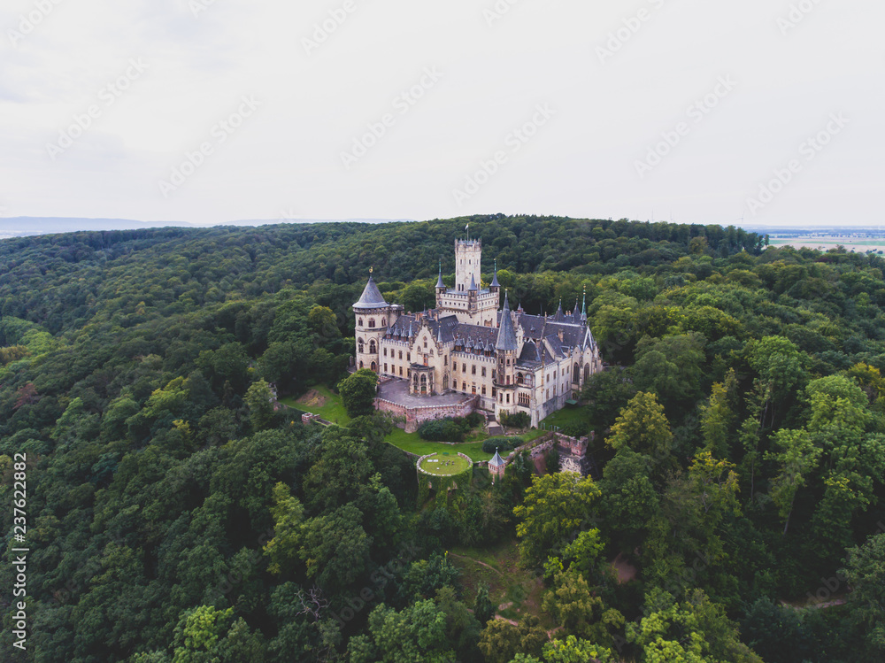 View of Marienburg Castle, a Gothic revival castle in Lower Saxony, Germany, near Hanover, drone aerial view