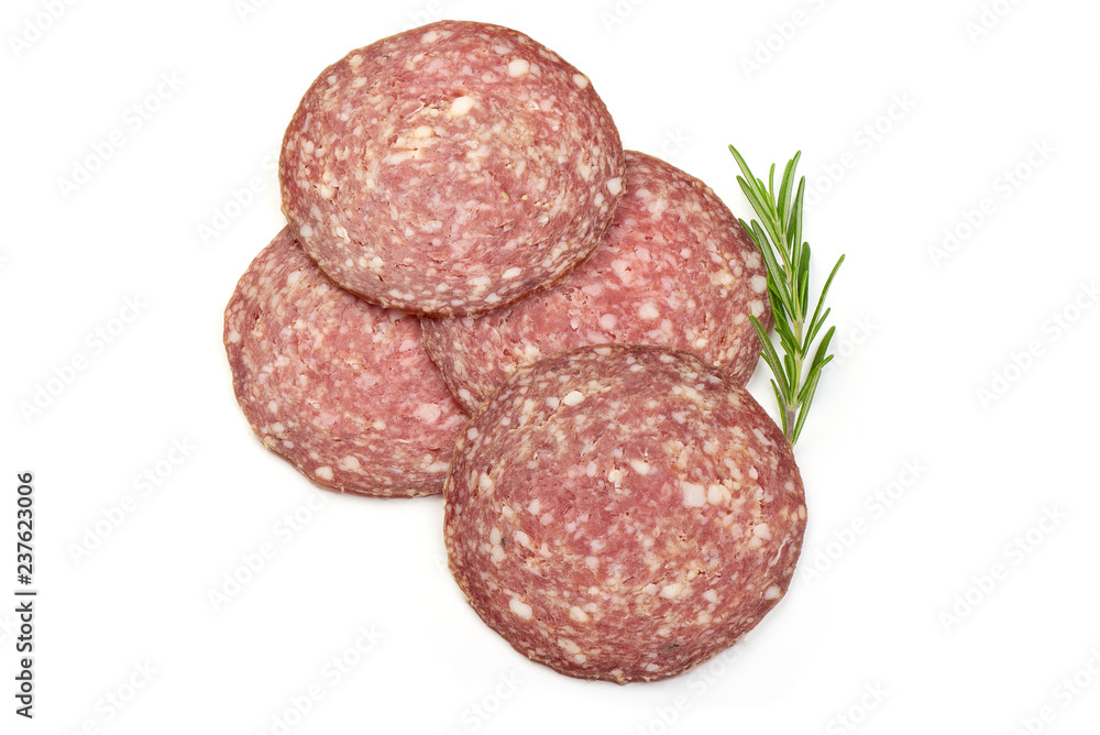 Thinly Sliced Salami with herbs, isolated on a white background. Top view Thinly Sliced Salami with herbs, isolated on a white background. Top view
