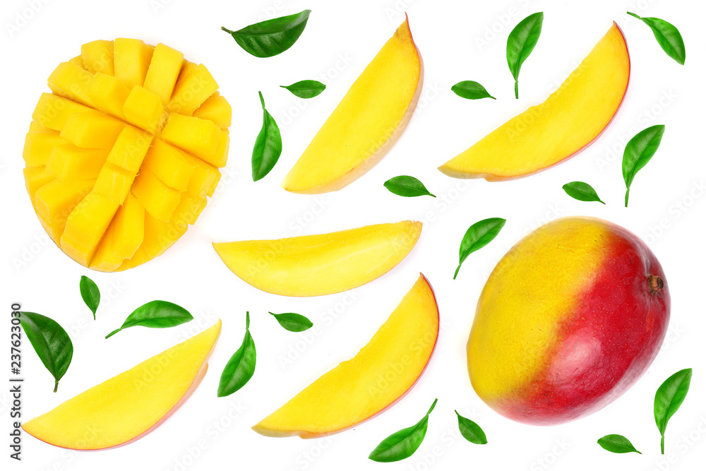 Mango fruit decorated with leaves isolated on white background close-up. Top view. Flat lay Mango fruit decorated with leaves isolated on white background close-up. Top view. Flat lay