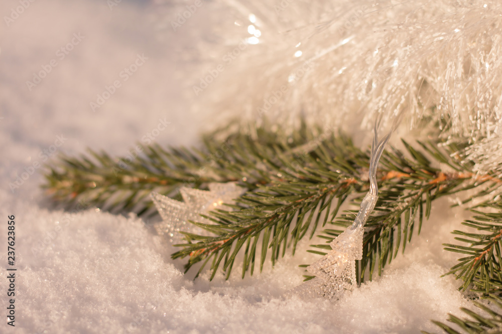 White shining decorations on the christmas tree. White shining decorations on the christmas tree.