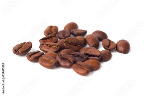Roasted coffee beans isolated on white background. Three coffee beans