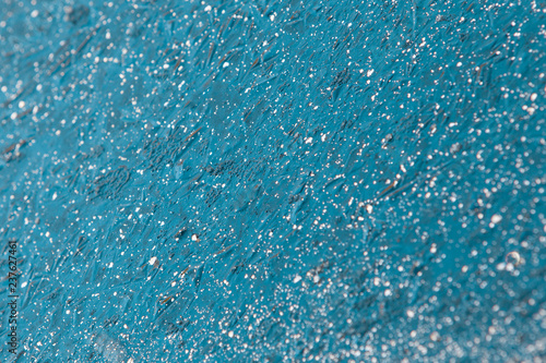 Teal glitter festive luxury turquoise crystal nature modern winter Christmas background with blue ice white snow