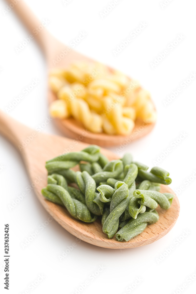 Uncooked spinach gemelli pasta. Uncooked spinach gemelli pasta.