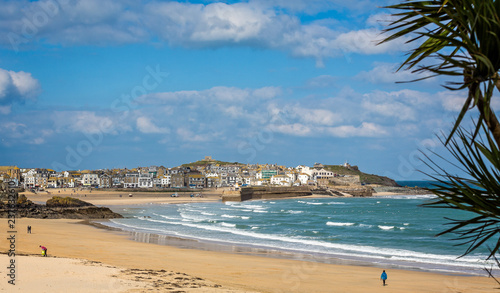 Harbour at St Ives with waves crashing against the harbour wall taken in St Ives, Cornwall, UK on 28 February 2016
