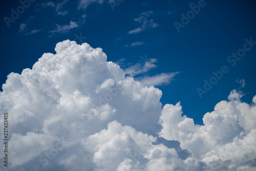 The vast cumulus cloudscape with blue sky