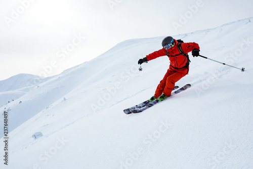 A man is skiing on the slope.