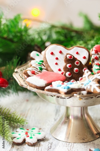 Decorated homemade Christmas Cookies on festive X-mas holiday background