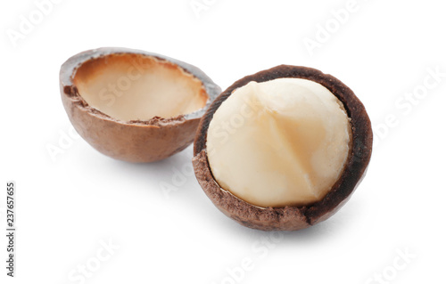 Organic Macadamia nut and shell on white background