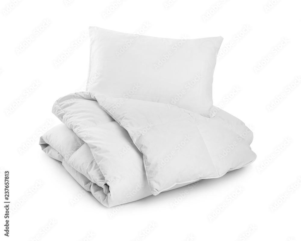 Clean blanket and pillow on white background Clean blanket and pillow on white background