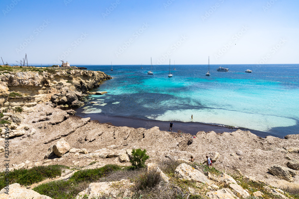 Cala Azzurra, one of the most popular beaches of Favignana, Aegadian Islands, Sicily, Italy