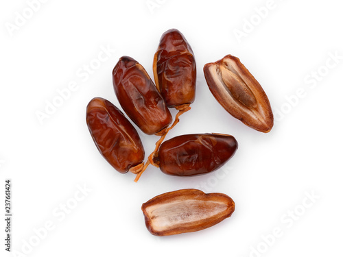 dried date fruits isolated on white background, top view, flat lay