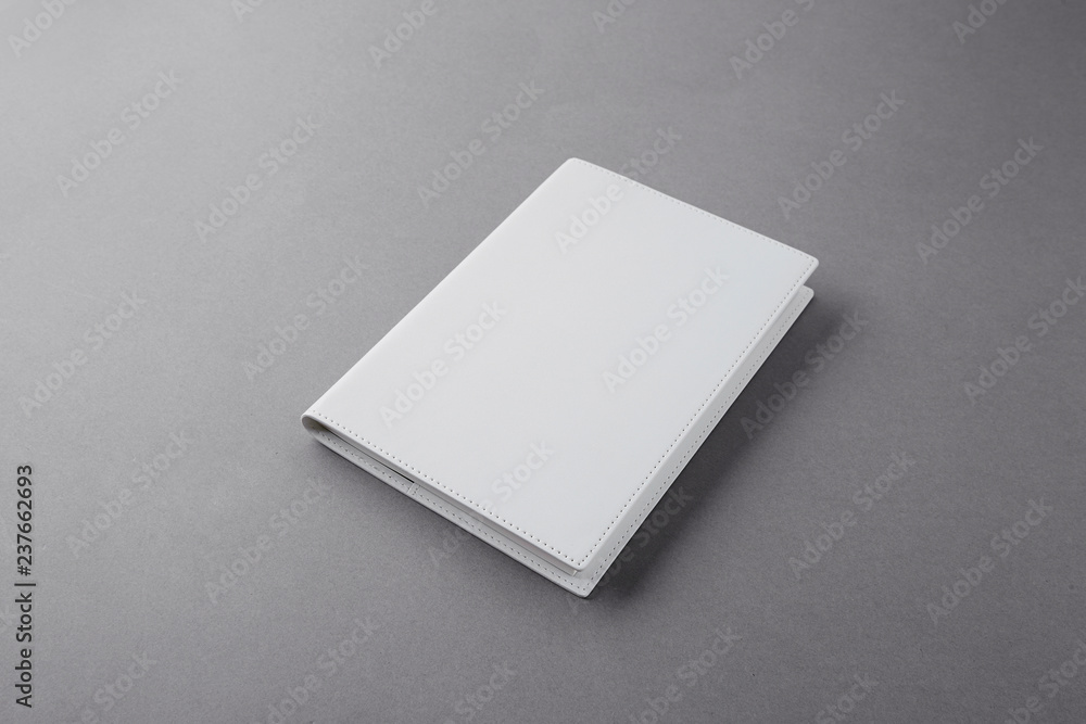 a white leather note a white leather note