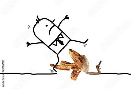 Cartoon Man Fallig down after Sliding on a Banana Peel photo