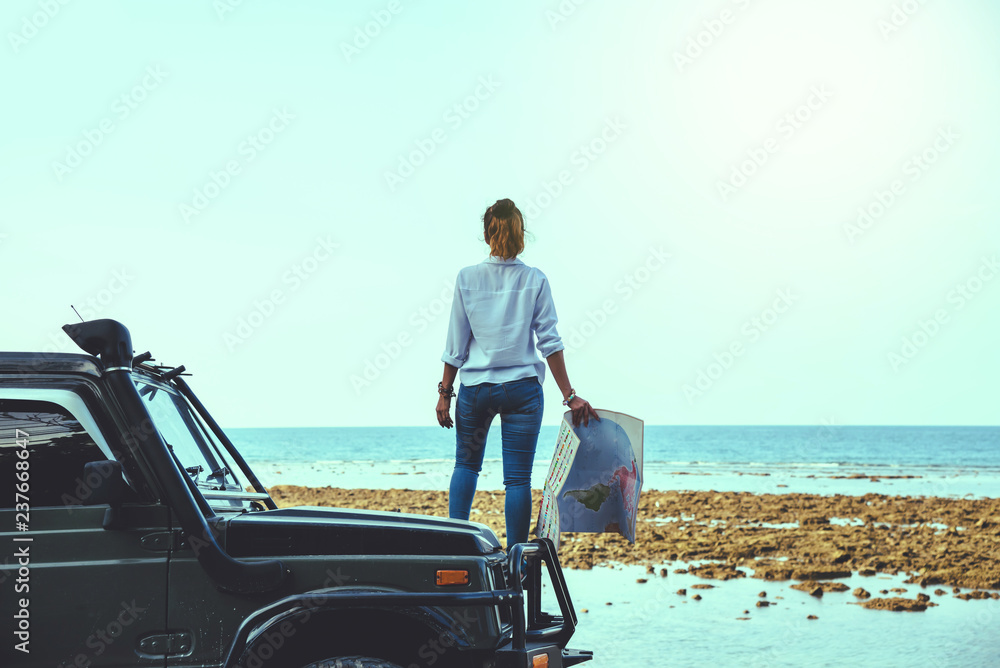 custom made wallpaper toronto digitalAsian woman travel nature. Travel relax. Stand on the car and In the map handle at the beach.In the summer. Thailand