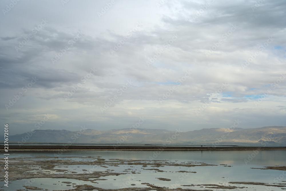 Dead Sea and overcast sky in cloudy weather