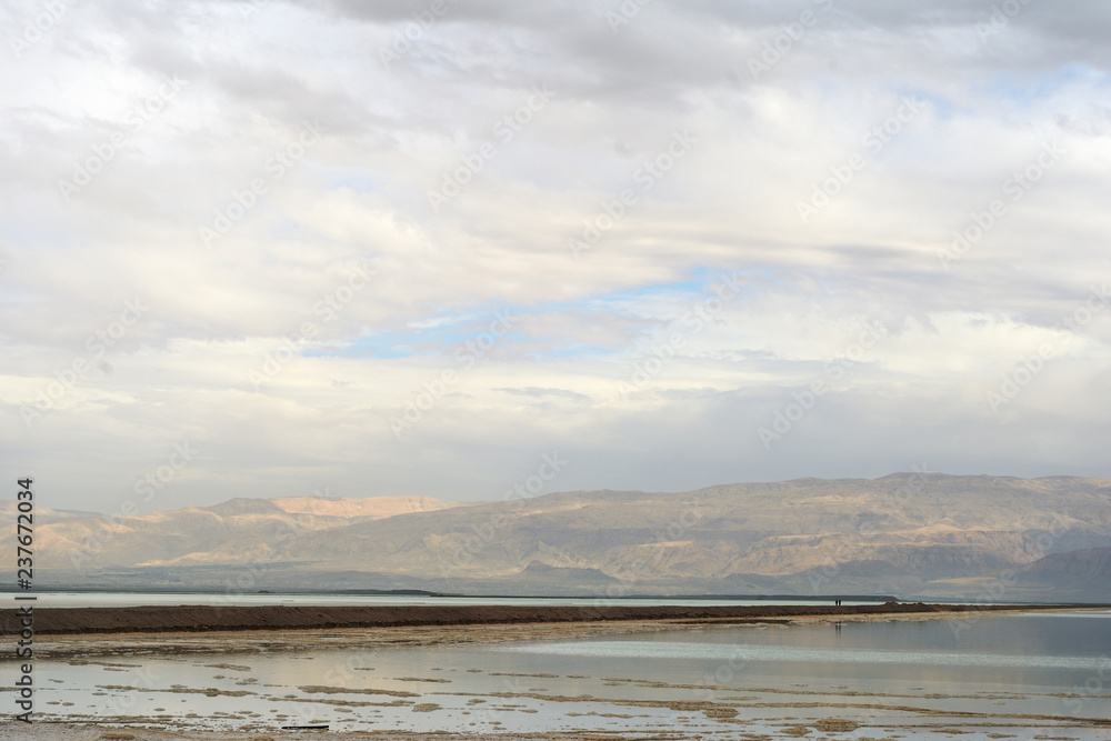 Obraz premium Dead Sea and overcast sky in cloudy weather