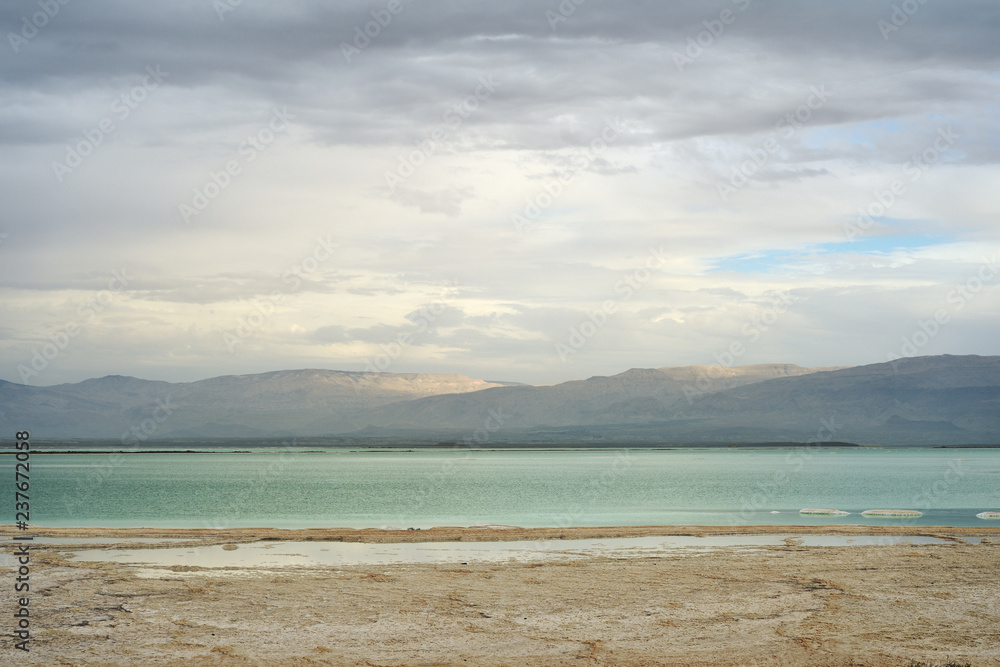 Obraz premium Dead Sea and overcast sky in cloudy weather