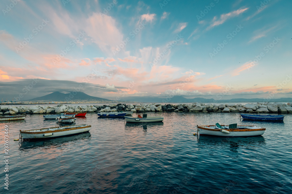 Boats and Mount Vesuvius at sunset, in Naples, Italy Boats and Mount Vesuvius at sunset, in Naples, Italy