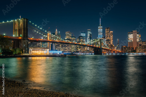The Brooklyn Bridge and Manhattan skyline at night, from DUMBO, Brooklyn, New York City © jonbilous