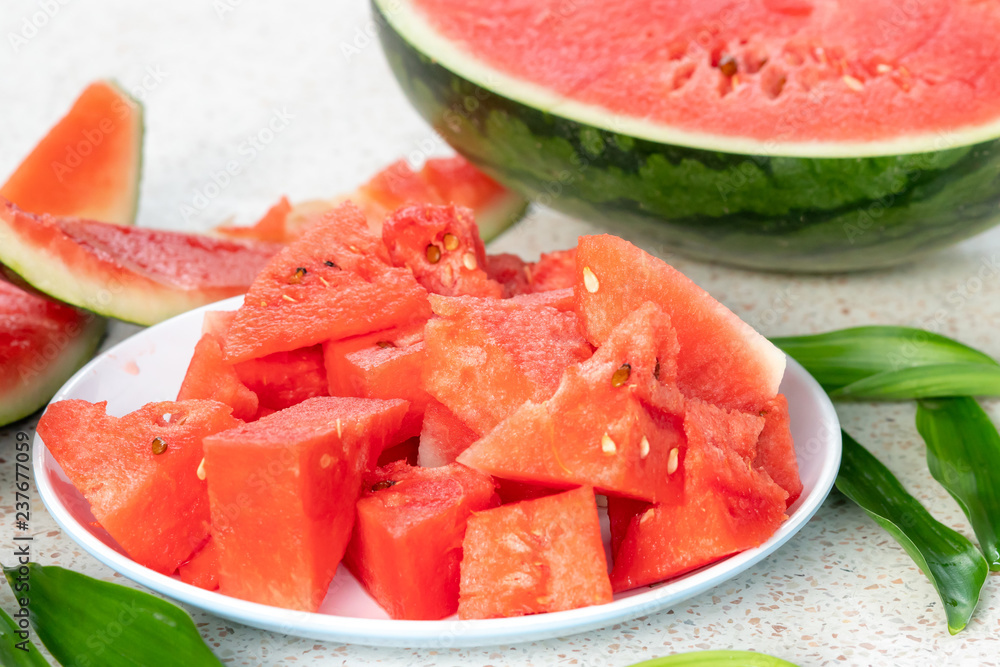A half of fresh watermelon on a table A half of fresh watermelon on a table