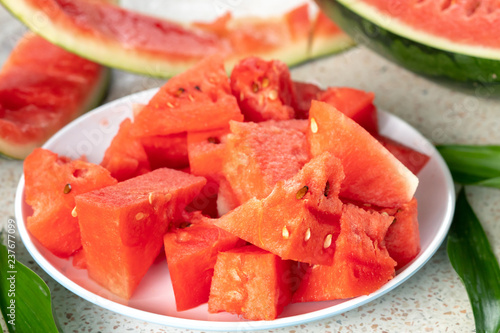 A half of fresh watermelon on a table