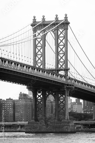 The Manhattan Bridge and East River, seen from DUMBO, in Brooklyn, New York City © jonbilous