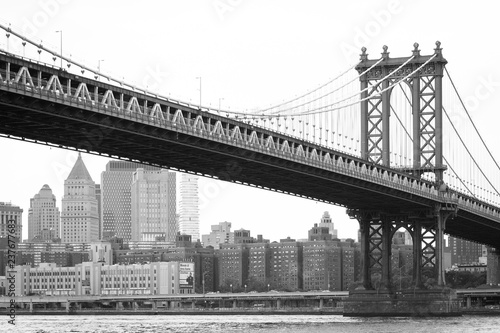 The Manhattan Bridge and East River, seen from DUMBO, in Brooklyn, New York City © jonbilous