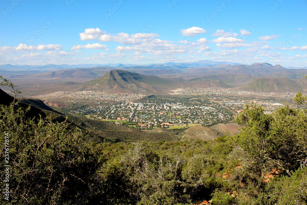 Fototapeta premium The beautiful little town of Graaff-Reinet in the central Karoo of South African, nestled in the river bend, and surrounded by mountains.