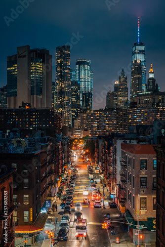 View of the Lower East Side and Financial District at night, from the Manhattan Bridge in New York City © jonbilous