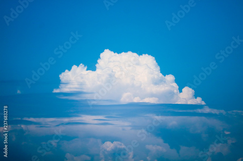 Beautiful heap clouds with clear blue sky and sunlight