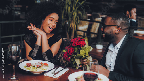African American Couple Dating in Restaurant