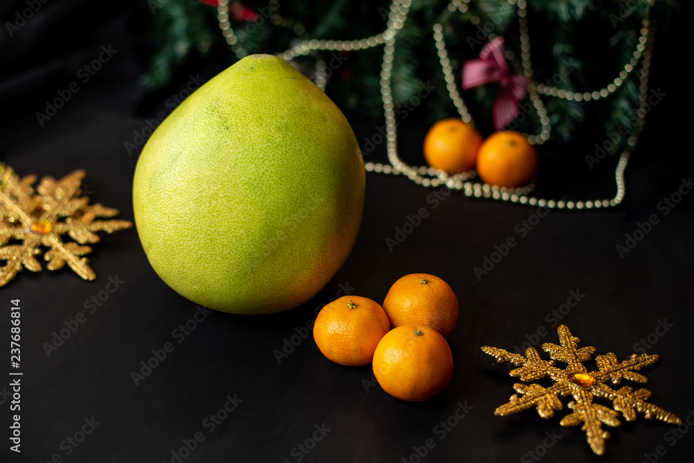 Christmas fruits, tangerines and pomelo.