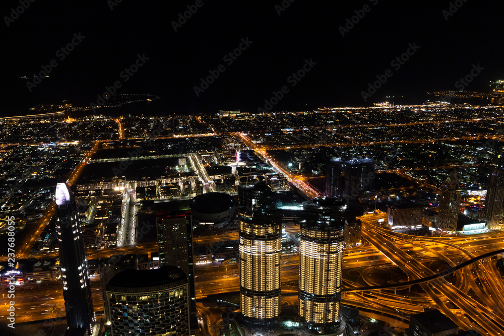 Fototapeta premium Night Dubai from the 125th floor of the Burj Khalifa Tower.