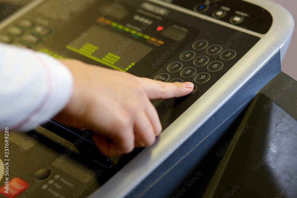 Close up of a touch pad technology on a cross trainer in a gym Close up of a touch pad technology on a cross trainer in a gym